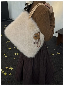 Plush off-white faux fur tote bag with braided rope strap and cute cartoon bear pendant