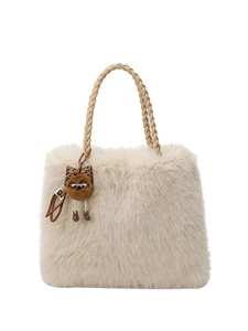 Beige faux fur tote bag with plush texture and woven handles featuring a bear charm