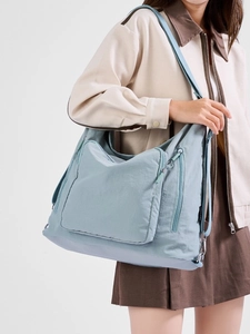 Light blue large capacity nylon tote bag with multi-pocket design for daily commuting