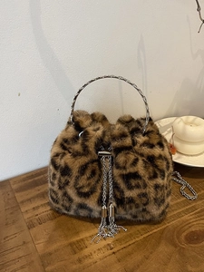 Furry leopard print bucket bag with silver metal ring handle and chain tassel for winter