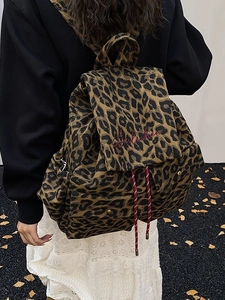 Leopard print canvas backpack with Seilichen embroidery and drawstring closure