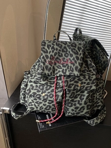 Green leopard print canvas backpack with large capacity and drawstring closure