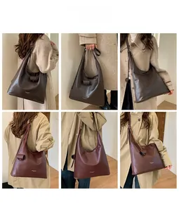 Detailansicht der großen Vintage Hobo-Tasche in kaffeebraunem und weinrotem Leder