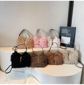 Detailed display of fuzzy tote bags in seven colors with sleek leather straps and metal buckles