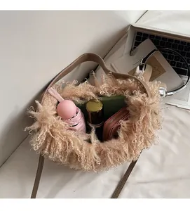 Top view of plush bucket bag showing interior space with umbrella and cosmetics