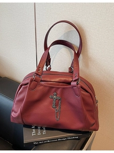 Retro burgundy pebble leather handbag with metal cross charm and vintage chain decor