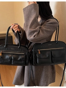 Black leather multi-pocket tote bag in large and small sizes with golden hardware