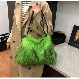 Close-up of bright neon green faux fur shoulder bag with black thin straps and soft texture
