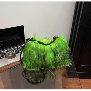 Detailed view of the neon green and black faux fur texture on a luxury crossbody bag