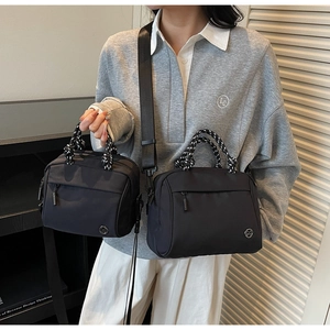 Size comparison of black nylon crossbody bags with woven rope handles and M-logo detail