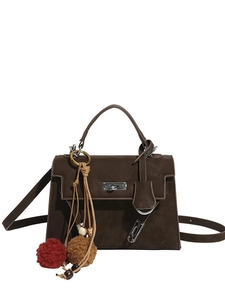 Retro dark brown suede trapezoid handbag with top handle and silver metal turn lock