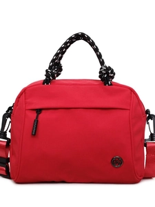 Chic red nylon crossbody bag with polka dot woven handle and minimalist square design