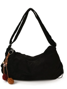Retro black faux suede hobo shoulder bag with colorful plush ball charm and long straps