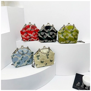 Detail view of vintage crossbody bags with crane embroidery in five assorted colors