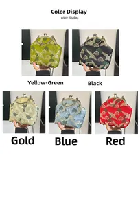 Detail view of crane embroidery on silk crossbody bags in five colors with metal clasps
