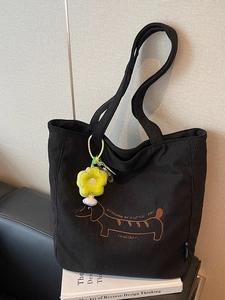 Fashionable corduroy tote bag with embroidered dachshund and floral charm in black