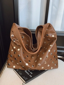 Brown large capacity PU leather tote bag with silver metal studs and wide shoulder strap
