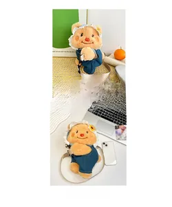 Detail of cream plush bear backpack wearing denim dress and hat in lifestyle scenes