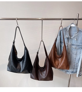Detailed comparison of large leather hobo tote bags in black, dark brown, and caramel colors