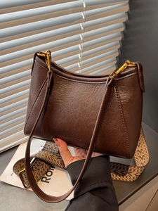 Vintage dark brown hobo shoulder bag with textured leather and bohemian strap