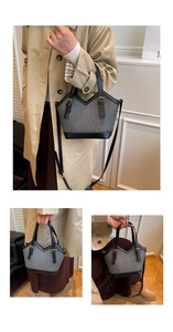 Detail of black and white houndstooth tote bag with V-shaped cut and gold hardware