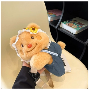 Detailed view of the cute plush bear backpack featuring a sunflower hat and blue overalls