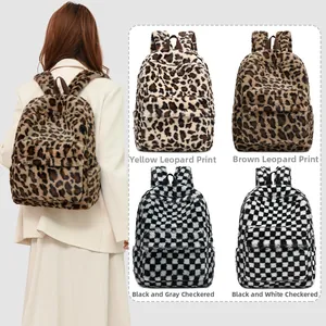 Macro view of plush leopard and checkerboard patterned backpack fabric textures