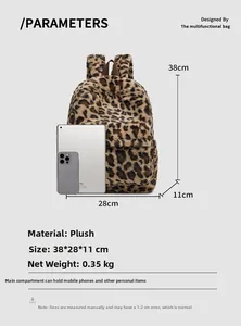 Detailed capacity view of leopard plush backpack featuring iPad and phone for size reference