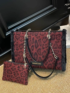 Retro leopard print tote bag with gold chain strap and matching small storage pouch