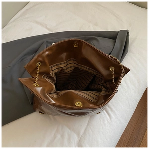 Brown quilted chain tote bag with retro PU leather and spacious interior view