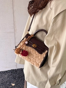Lambswool Kelly bag in brown patent leather with heart-textured faux fur and gold lock