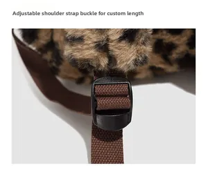 Detail of adjustable shoulder strap buckle on plush leopard print backpack