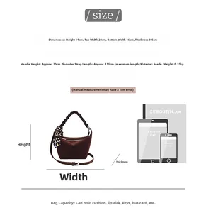 Detailed size chart for the brown vintage bucket bag showing dimensions and crossbody strap length