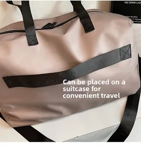 Travel duffel bag featuring a convenient trolley sleeve for easy luggage attachment