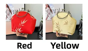 Detail of red and yellow silk shell bags with bamboo embroidery and chain handles