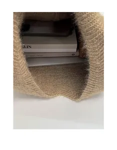 Internal view of the brown knit tote bag showing spacious capacity for daily essentials