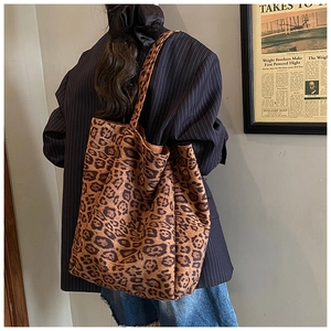Detail of the leopard print tote bag showing rich texture and large capacity design