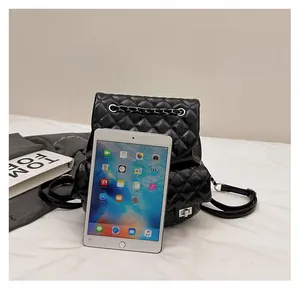 Size comparison of quilted leather backpack next to an iPad showing compact dimensions