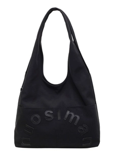 Sac hobo minimaliste en toile noire avec patchs lettres et large bandoulière souple