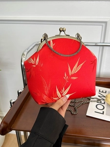 Vintage Chinese style red brocade handbag with golden bamboo embroidery and chain strap