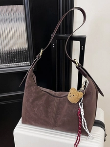 Vintage brown large capacity dumpling bag with plush bear charm and adjustable strap