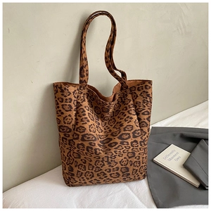 Close-up of leopard print tote bag featuring fuzzy suede texture and large capacity