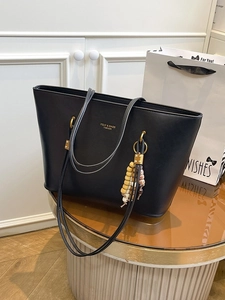 Retro black large capacity tote bag with dual straps and beaded charm for women