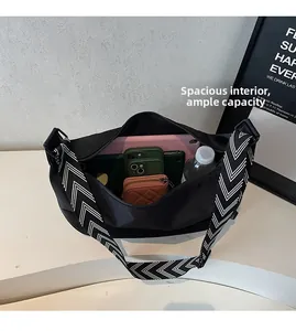 Macro view showing spacious interior of black nylon bag with large storage capacity