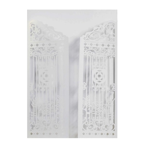 Detail of laser-cut white wedding invitation with elegant floral hollow gate pattern