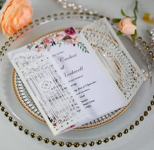 Laser cut white wedding invitation with lace rose pattern and floral inner card