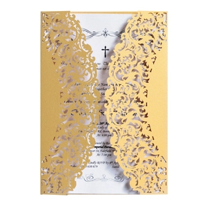 Golden laser cut lace wedding invitation with floral patterns and white inner sheet