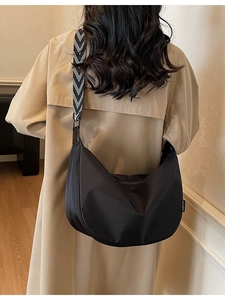 Black crescent oxford hobo bag with stylish black and white herringbone wide strap