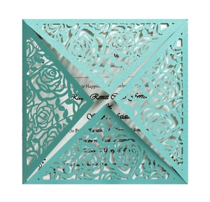 Mint green laser-cut rose invitation cover with shimmering pearlescent paper finish