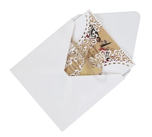 Elegant laser cut floral wedding invitation set with rustic kraft paper and twine detail